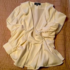 Cream peplum top
